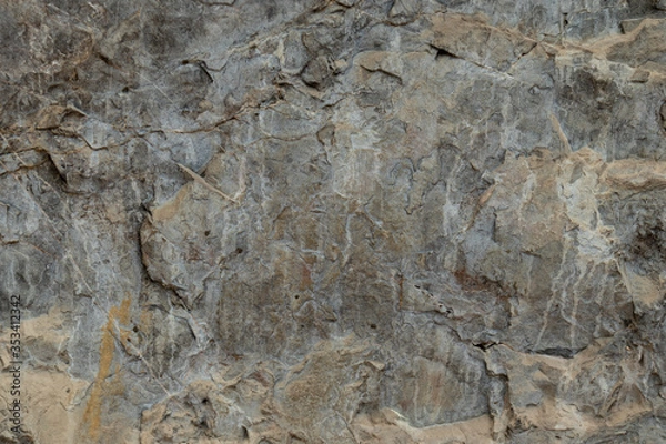 Fototapeta the texture of the cave or rocky cliffs are rugged with vignette background