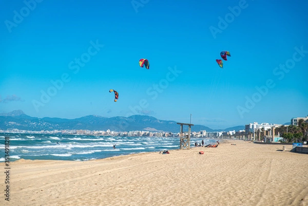 Obraz PALMA DE MALLORCA, SPAIN - MAY 11 2020 : Kite Surfer at the Playa de Palma  at  - Mallorca during Corona Lock down  on May 11, 2020 in Palma de Mallorca, .
