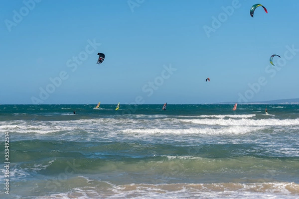 Obraz PALMA DE MALLORCA, SPAIN - MAY 11 2020 : Kite Surfer at the Playa de Palma  at  - Mallorca during Corona Lock down  on May 11, 2020 in Palma de Mallorca, .