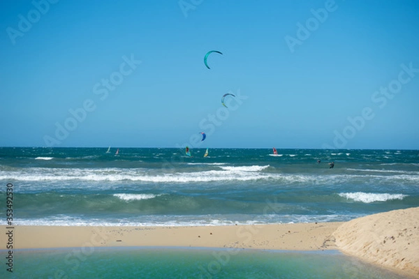 Obraz PALMA DE MALLORCA, SPAIN - MAY 11 2020 : Wind surfer at the Playa de Palma  at  - Mallorca during Corona Lock down  on May 11, 2020 in Palma de Mallorca, .