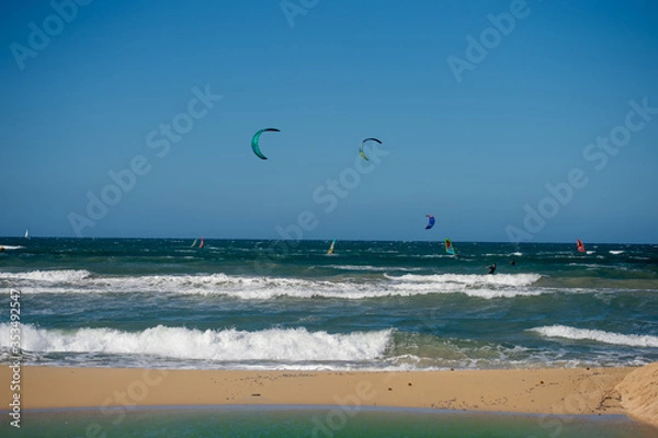 Obraz PALMA DE MALLORCA, SPAIN - MAY 11 2020 : Kite Surfer at the Playa de Palma  at  - Mallorca during Corona Lock down  on May 11, 2020 in Palma de Mallorca, .