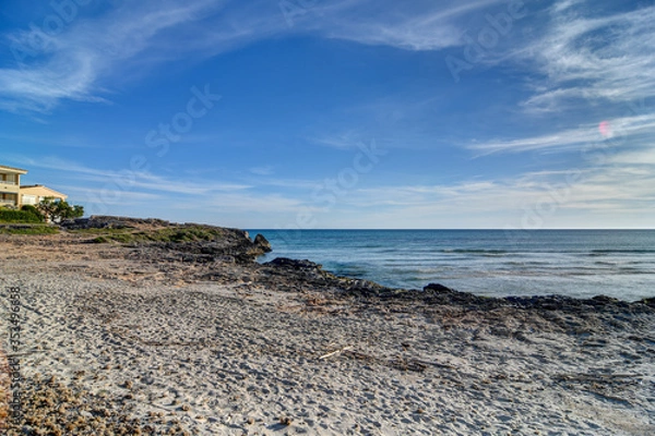 Obraz PALMA DE MALLORCA, SPAIN - MAY 3 2020 : Beach of Ses Covetes  at  - Mallorca during Corona Lock down  on May 3, 2020 in Palma de Mallorca, .