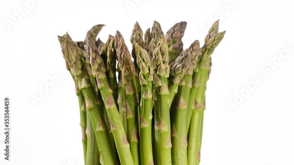 Obraz asparagus isolated green bunch on white background, central composition