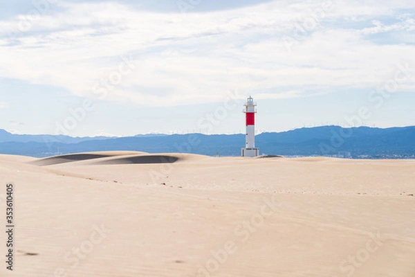 Fototapeta DELTA DE L'EBRE, TARRAGONA, CATALUNYA, SPAIN - JUNE 5, 2019: Beach of "punta del fangar" lighthouse "far del fangar".
