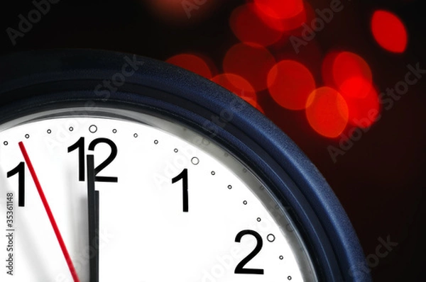 Fototapeta Office clock about to show midnight - few seconds to New Year