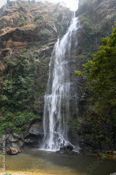 Fototapeta Wli Waterfalls in the middle of the mountains in Ghana.