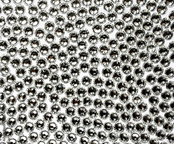 Obraz Crystals. Crystal strasses on a abstract Living white background. Beautiful shiny sparkling silver rhinestones.