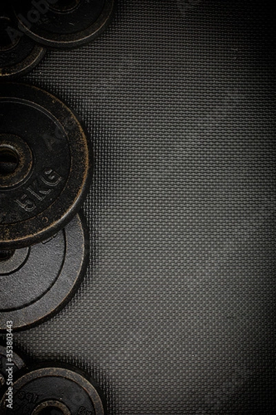 Obraz weight discs on mat