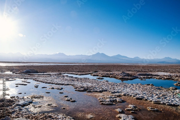 Obraz Quietly situated sea with a view of distant mountains on the horizon