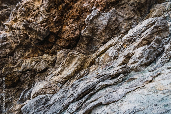 Fototapeta Natural texture background of wet rock, Majorcan stone