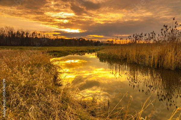 Obraz zachód słońca nad wartą
