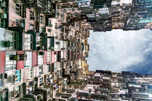 Fototapeta The popular between tourists place called Montane Mansion near to Tai Koo in Hong Kong. Overcrowded old retro building