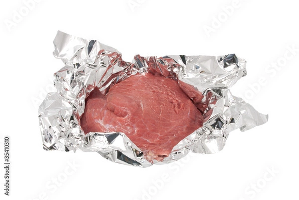 Obraz Crude meat in a foil