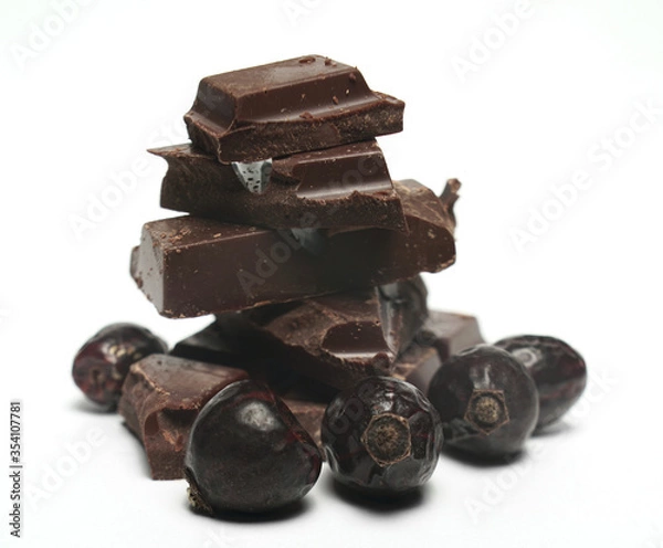 Fototapeta Chokolate with rosehip on white background
