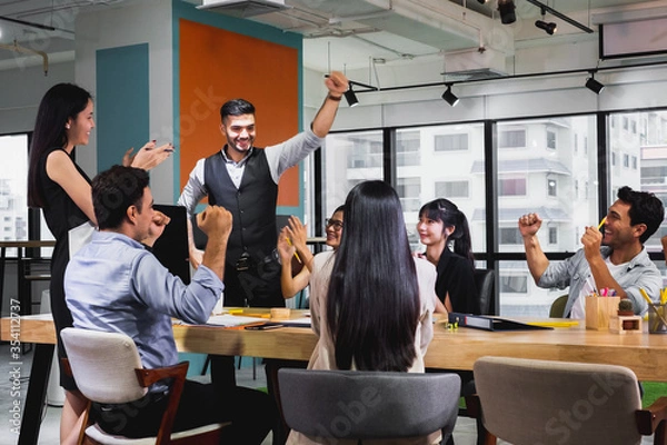 Fototapeta business team celebrate together in office, teamwork success win strategie meeting table