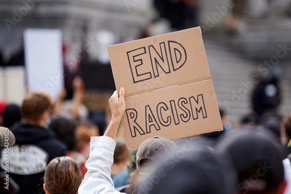 Fototapeta Sign "END RACISM" at the Police Violence march in Vancouver, BC