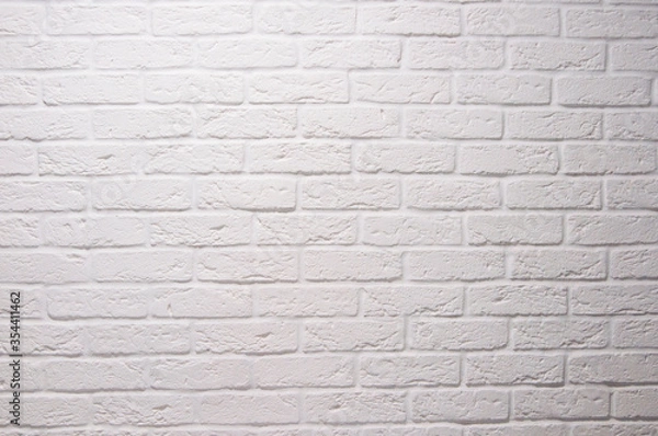 Fototapeta Texture of a white painted brick wall as a background or wallpaper
