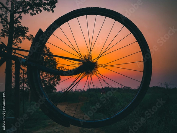 Obraz Wheel on sunset.