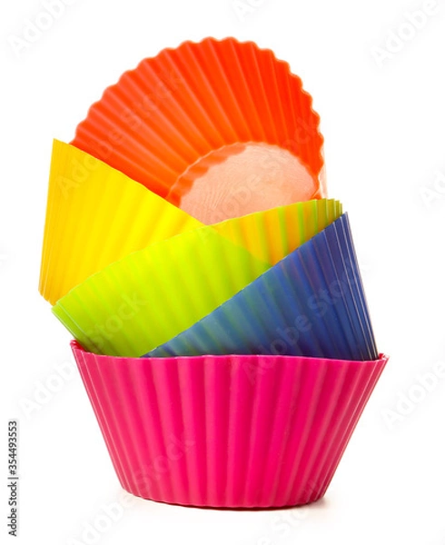 Fototapeta Muffin baking cups on white background