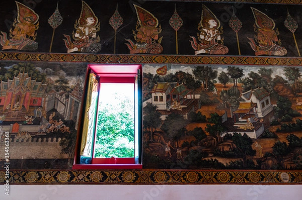 Obraz Historic temple wall art in UNESCO World Heritage Site, Ayutthaya, Thailand.  With window opens and the light shines in.