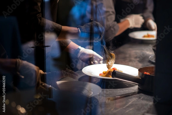 Obraz Busy kitchen with team chef