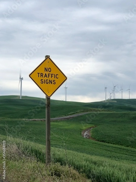 Obraz No traffic signs - yellow warning sign on a road