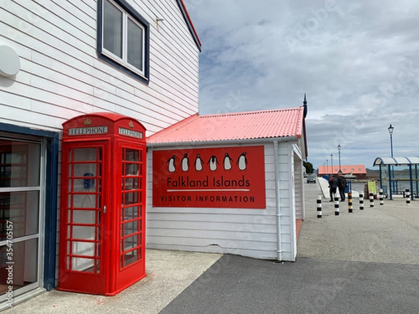 Fototapeta The town called "Stanley" on the Falkland Islands. Typical British telephone box close to the tourist information