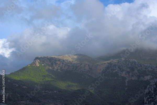 Fototapeta clouds over the mountains