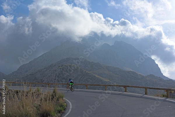 Fototapeta mountain biking in the mountains