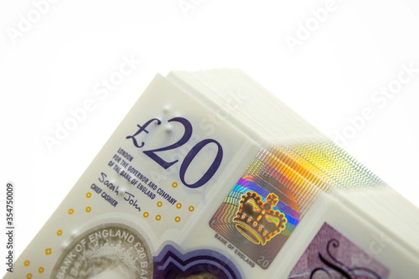 Obraz 20 Sterling Pounds banknotes. Corner of the stack. New British polymer money. Macro photo.