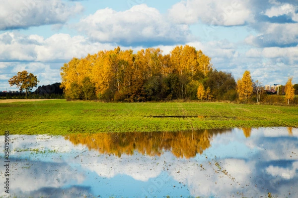 Obraz Landscape of the valley in Europe, Cloudy sky and autumn colors, water reflection.