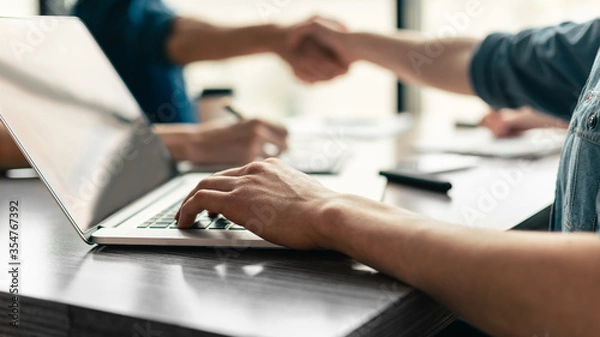 Fototapeta close up. business man working on a laptop in the office.