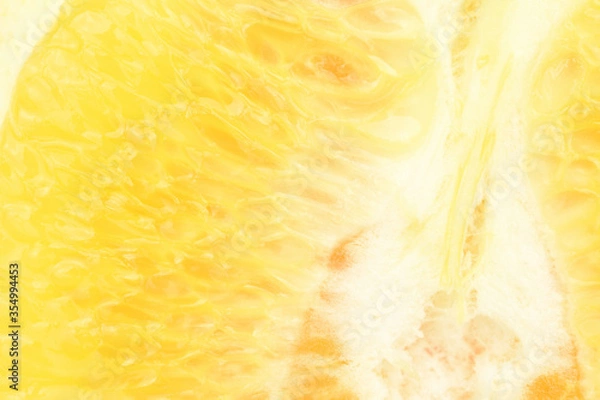 Fototapeta Ripe, organic orange, macro, on a white background.