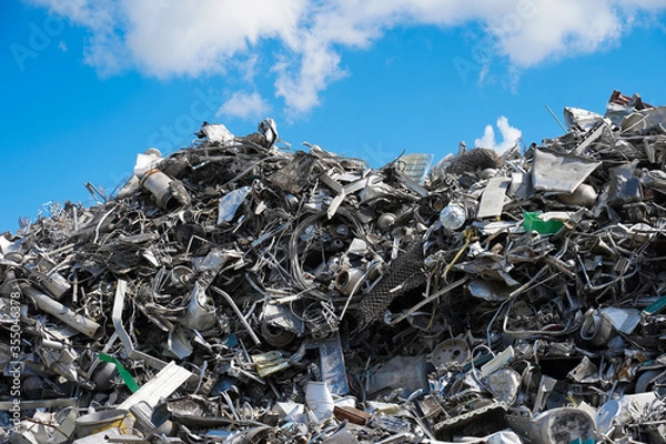 Obraz A lot of aluminum collected for processing on the sky background