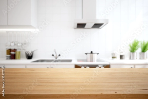 Obraz Wood table top on blur kitchen counter background.
