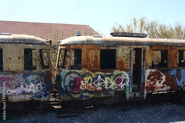 Fototapeta Old rusty abandoned locomotive train