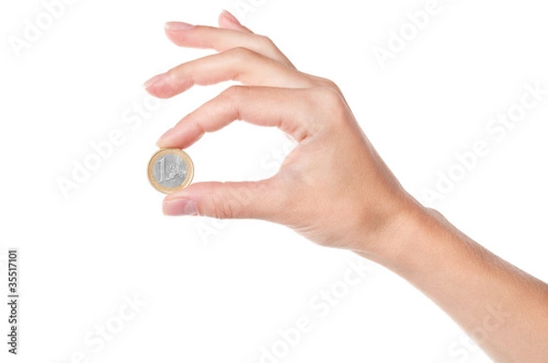 Fototapeta Dłoń trzymająca monety 1 euro