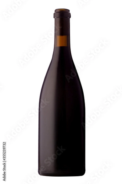 Fototapeta A labelless bottle of red wine on a white background.