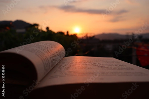 Obraz open book with sunset