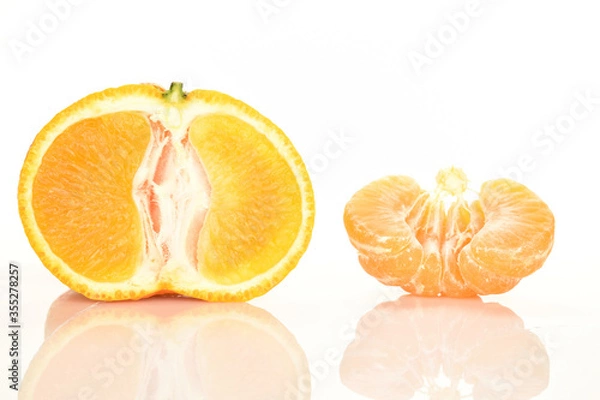 Fototapeta Bright yellow juicy, fresh, organic tangerines, close-up, on a white background.