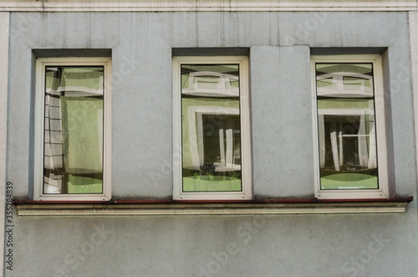 Fototapeta Three windows with reflection