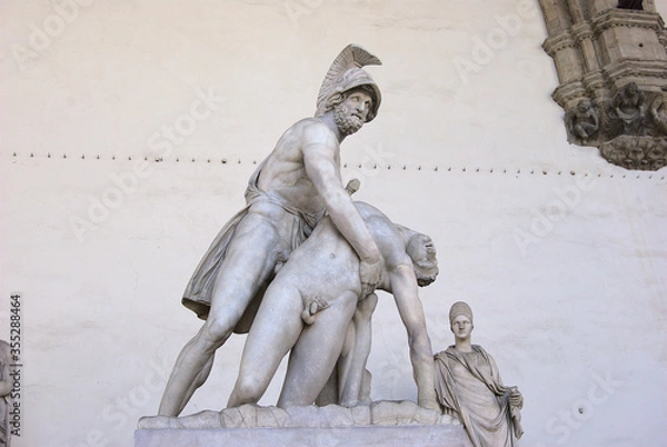 Obraz Florence, Italy August 16 2018: Aiace and Achille marble sculpture, located in Loggia de' Lanzi, in piazza della Signoria