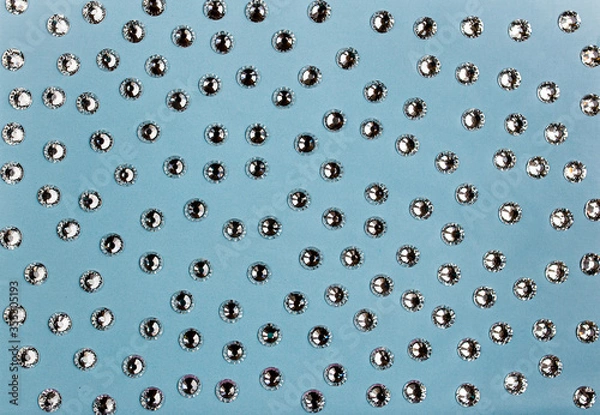 Obraz Crystals. Crystal strasses on a abstract Living blue background. Beautiful shiny sparkling silver rhinestones.