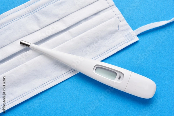 Fototapeta 体温計とマスク
