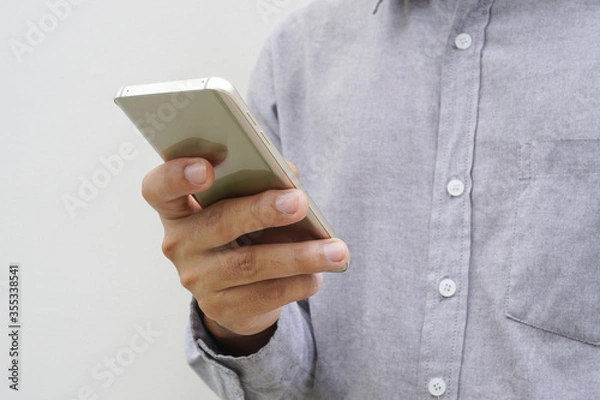 Fototapeta Touch screen smartphone, in hand