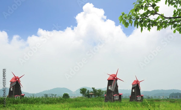 Obraz 파란하늘과 풍차가 어울어진 소래습지 풍경