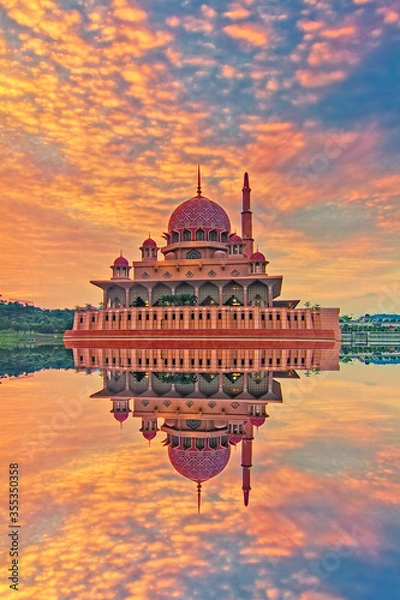 Fototapeta Beautiful architectural design of Putra Mosque with magnificient sunrise at the background