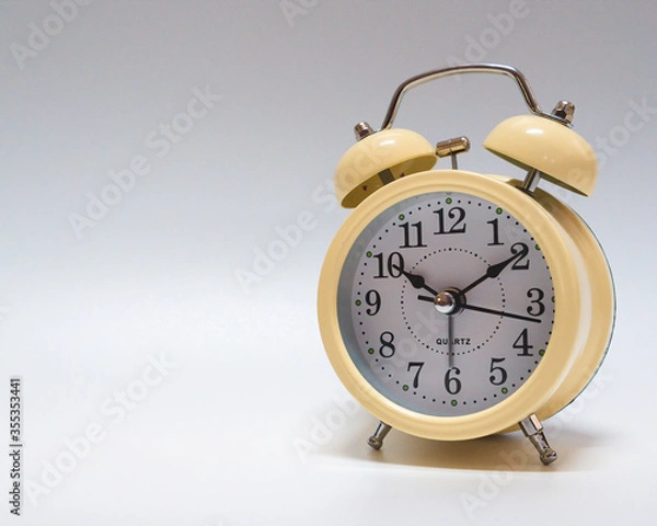 Fototapeta analog alarm clock on white background