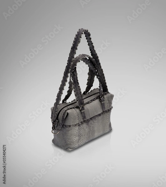 Fototapeta Leather Women's Bag Isolated on Gradient Background