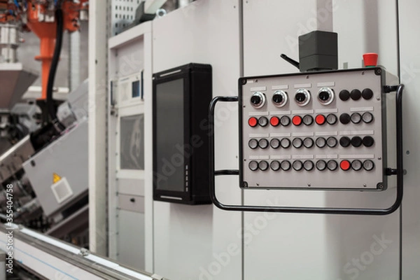 Fototapeta Close Up Shot of a Machinery Control Unit 